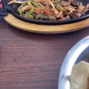 fajitas that were not even sizzling but that was because of the waiter screwing around not doing his job