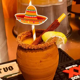 a drink with a mexican hat on top