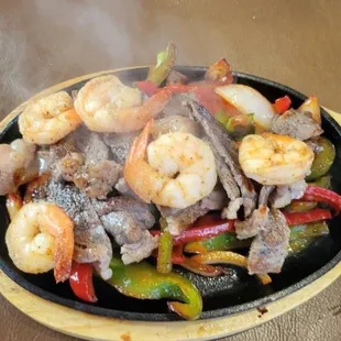 Fajitas with steak and shrimp.