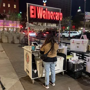 a woman at a food stand