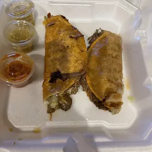 Quesabirria. I had 4 with rice and beans for 18.20$