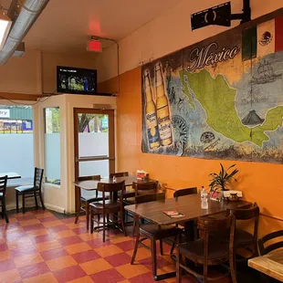 Dining room with enough space between tables.