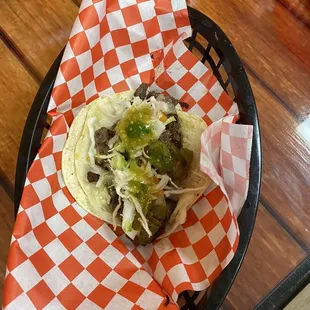 This is called Taco hass  this is a delicious taco with melted cheese and grilled chilies.