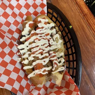 This one is called El Yori Dogo come with broad weenie wrap in bacon melted cheese pinto beans and a green pepper.