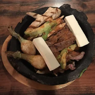 Molcajete! OMG so much food and so tasty!! Excellent choice!