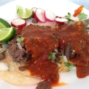 They had .50 Thursday tacos specials but I got the regular carnes asada &amp; lengua tacos for $1.39 each.  The red sauce was good.