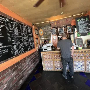 a man standing in front of the counter