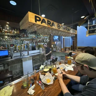 a man sitting at a bar
