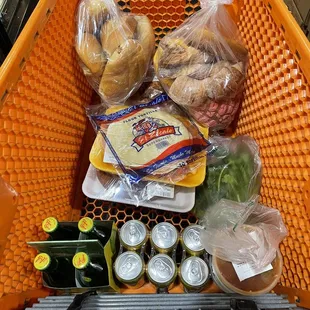 a shopping cart full of groceries