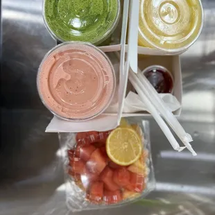 Green juice, orange strawberry and banana smoothie, mango agua fresca, pico de gallo