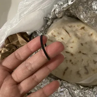 Why is there a rubber band in my pupusas ?!