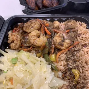 Large jerk shrimp, rice and peas, cabbage and plantains
