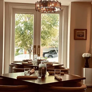 We love our antiqued mirror handmade chandeliers!