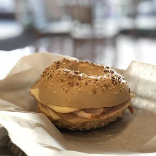 The everything bagel with turkey and cheese on it was not that great because the bagel was dry and chewy; the bagel was not fresh at all.