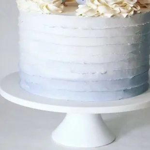 a blue and white cake