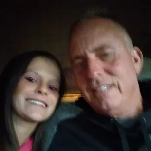 a man and a woman smiling