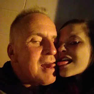 a man and a woman sharing a laugh