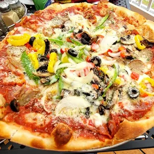 a large pizza with various toppings