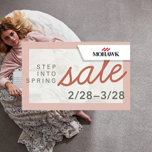 a woman laying on a bed with the words mohawk into spring sale