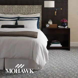 a bed in a hotel room