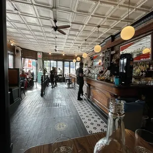 a view of a bar from the front of the room