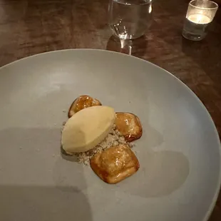 Sweet Potato and Brown Butter ice cream atop pecans and toasted marshmallows.