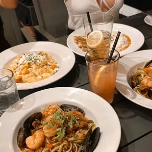 Seafood pasta, butternut squash pasta, and red lentil curry