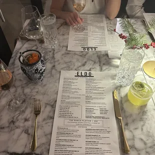 Menu, (Mezcal cocktail left), (agave tequila cocktail right)