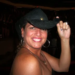 a woman in a cowboy hat
