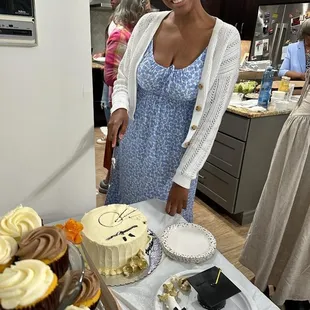 My beautiful daughter cutting her grad cake! Chocolate cake with cream cheese frosting! Yum yum!!!