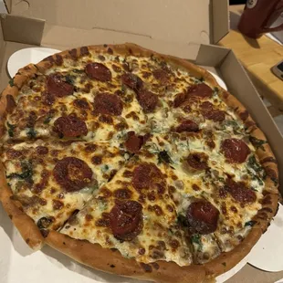 Large Alfredo Spinch pizza with pepperoni and beef
