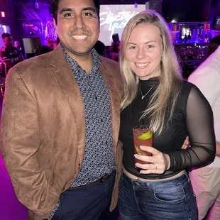  man and a woman at a party