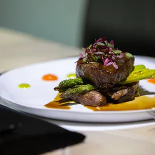 Steak entree at an immersive dinner