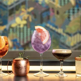 a variety of cocktails on a table