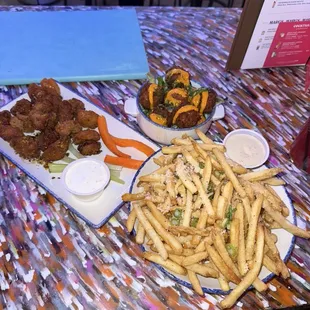 Truffle fries, Lemon Pepper with honey boneless wings, truffle Mac and cheese bites