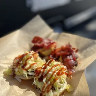 a hot dog with ketchup and coleslaw