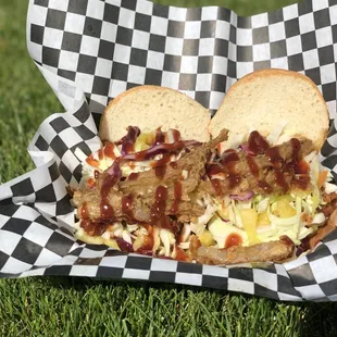 a pulled pork sandwich with cole slaw