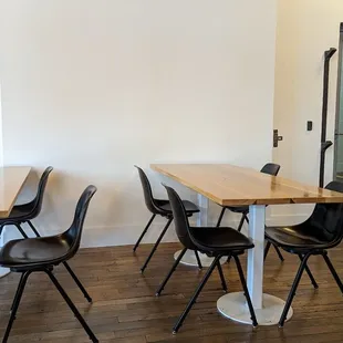tables and chairs in a coffee shop