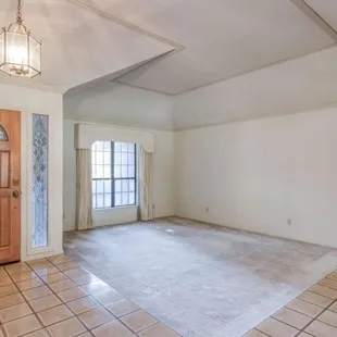 Before- Formal sitting area with 1980s chandelier.
