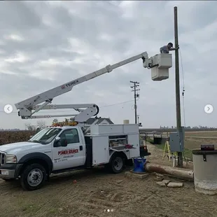 In the boom truck helping out our Ag community with powering their well pump.