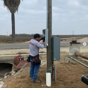 Helping to get power for an Ag well pump.