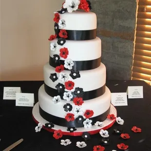 Beautiful 4 tier, white chocolate fondant, wedding cake to serve 100.