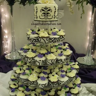 The wedding cake/cupcakes Lori made for us!!  Custom cupcake wrappers too!!