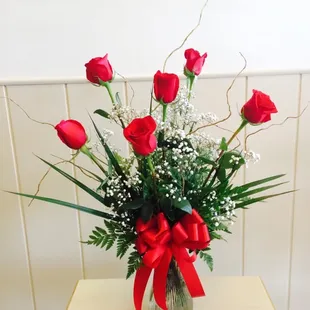 Half dozen long stem roses $50. $40 for reg size.