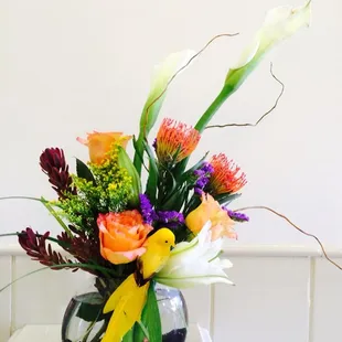 showcase arrangement, this week at the flower shop on the corner of First and Nees! look on our website for pricing.