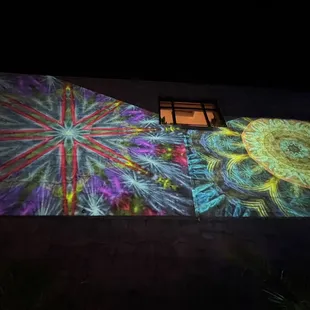 a colorful mural on the side of a building