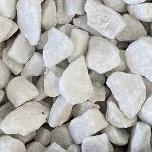 Dolomite.  One of our most popular crushed decorative rocks.  It sparkles in the sunlight!