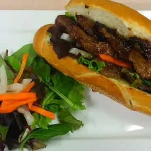Tender beef baguette with house salad in apricot vinaigrette