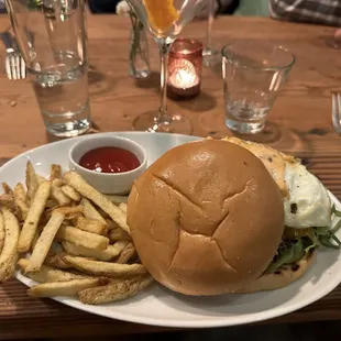 a burger and french fries on a plate