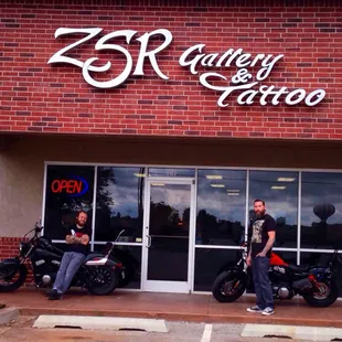 Zak &amp; Kevin outside of the shop